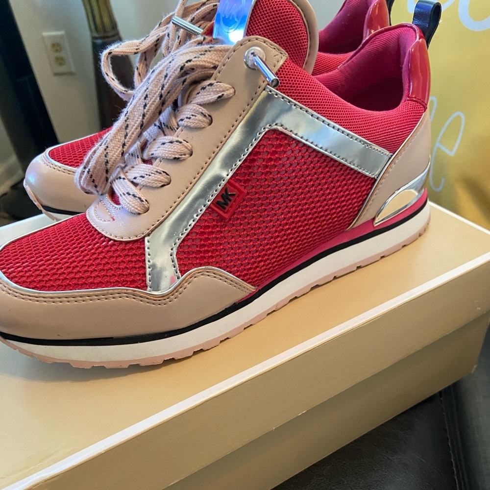 Michael Kors sneakers sz 7.5 used has a coupled marked on front look at all pics